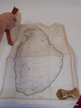 Voyage à l'Île de Ceylan, fait dans les années 1797 à 1800 ; Contenant l'Histoire, la Géographie et la Description des moeurs des habitans, ainsi que celle des productions naturelles du pays, par Robert Percival, Suivi de la relation d'une Ambassade envoyée, en 1800, au roi de Candy ; orné de plusieurs Planches, et d'une Carte de l'île de Ceylan, dressée par M. Arrowsmith, d'après l'original appartenant à la Compagnie de Indes Orientales. Traduit de l'anglais par P.F. Henry. (2 volumes)
