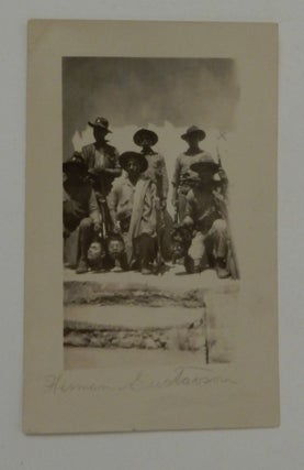 Real Photo Postcard (RPPC) depicting six soldiers (probably the Nicaraguan National Guard) holding the heads of three decapitated bandits