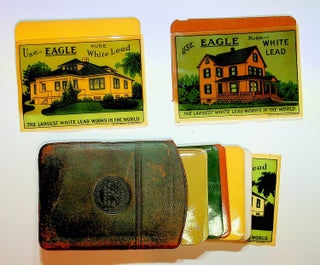 Color sample set of 20 Eagle White Lead Company paints with three celluloid house designs, in the originial leather folder
