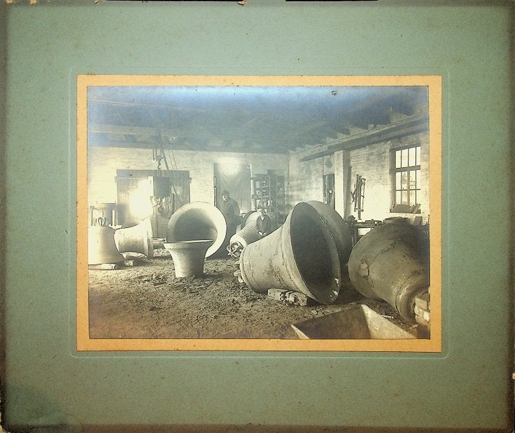 Item #27937 [Photography, Industrial] Silver print of a Bell foundry showing eight very large bells.