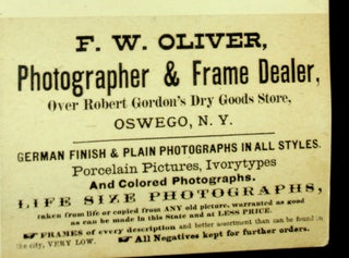 Albumen photograph of the ship OSWEGO BELLE with great photographer label on rear