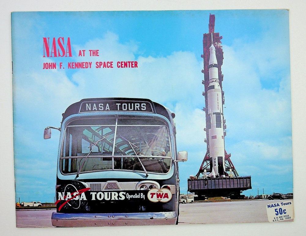 Item #28927 NASA at the John F. Kennedy Space Center [cover title]. Lee R. Scherer, John F. Kennedy Space Center Director, NASA.