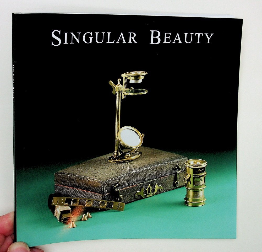 Item #29020 Singular Beauty: Simple Microscopes from the Giordano collection. Catalogue of an exhibition at the MIT Museum September 1st 2006 to June 30th 2007. Ray with Giordano, Deborah G. Douglas, Anthony Turner.