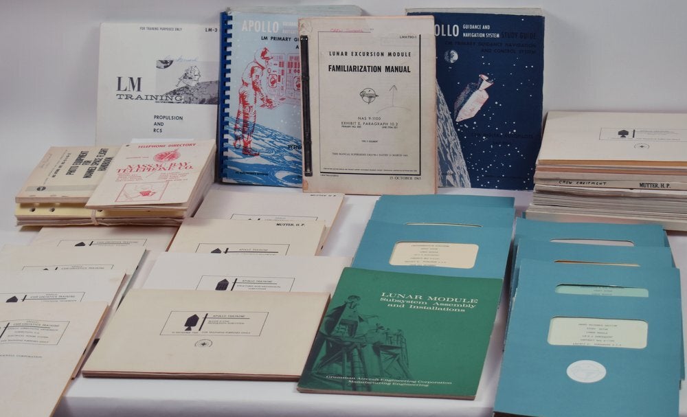 Item #29710 [archive, Space exploration] The Astronaut Office: "Thanks for your assistance - what can we do in return?" Him: Can I get "a full set of Apollo astronaut training manuals?" The Astronaut Office: "Ok". NASA, General Motors, Grumman, North American Aviation Inc., North American Rockwell Corporation.